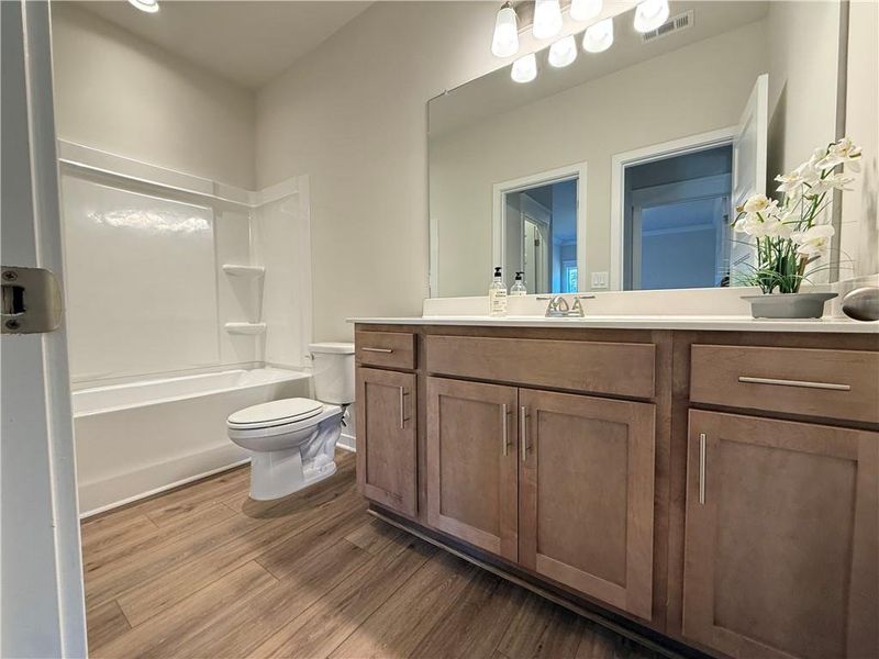 Furnished interior view inside a new home in Ponderosa Farms Manor, Gainesville (Image 13).