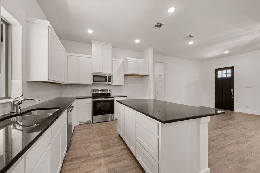 Furnished interior view inside a new home in Saddleback Estates, Boyd (Image 6).