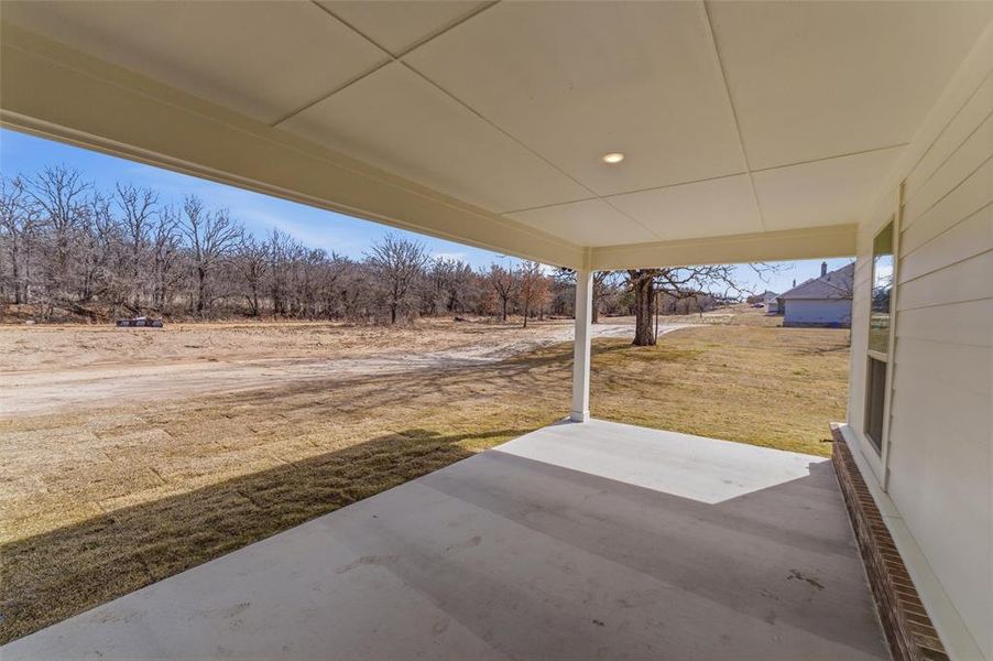 Exterior details and patio area of a home in Oak Grove Addition, Springtown (Image 3).