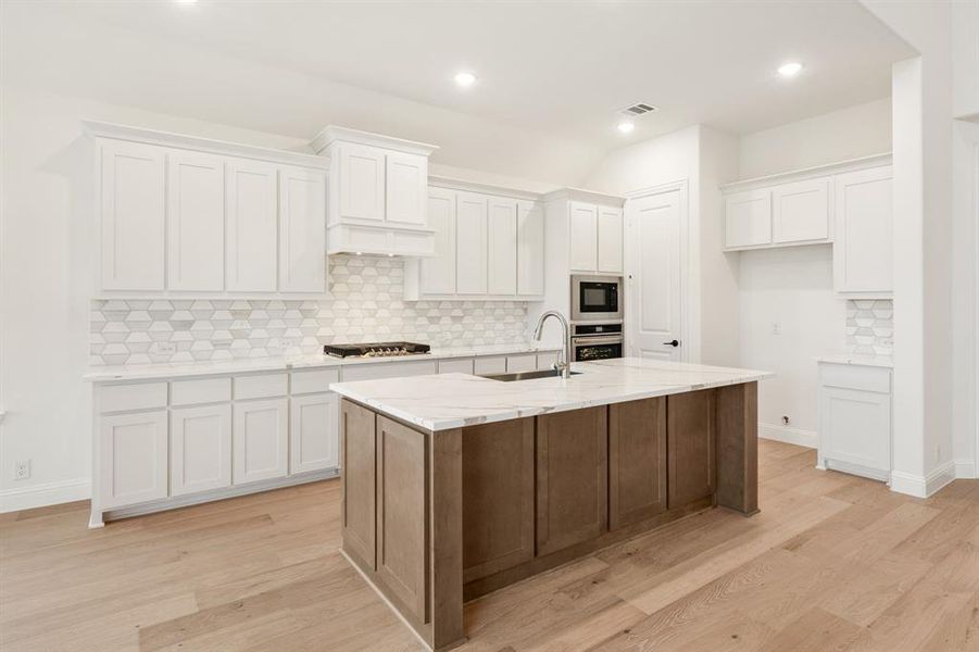 Furnished interior view inside a new home in Windsong Ranch Classic 61, Prosper (Image 13).