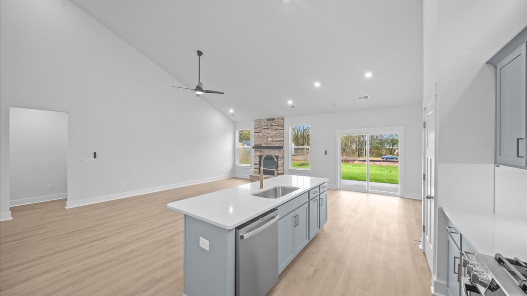 Highly skilled kitchen design includes an 8-foot island with quartz countertops Highly skilled kitchen design includes an 8-foot island with quartz countertops