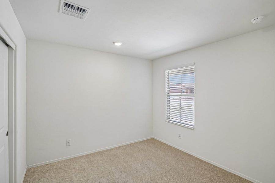 Spacious, unfurnished interior of a new home in Mandarina Reserve, Marana (Image 21).