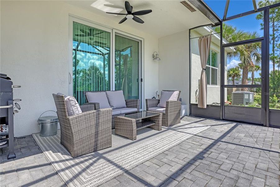 Exterior details and patio area of a home in The Timbers at Everlands, Palm Bay (Image 21).