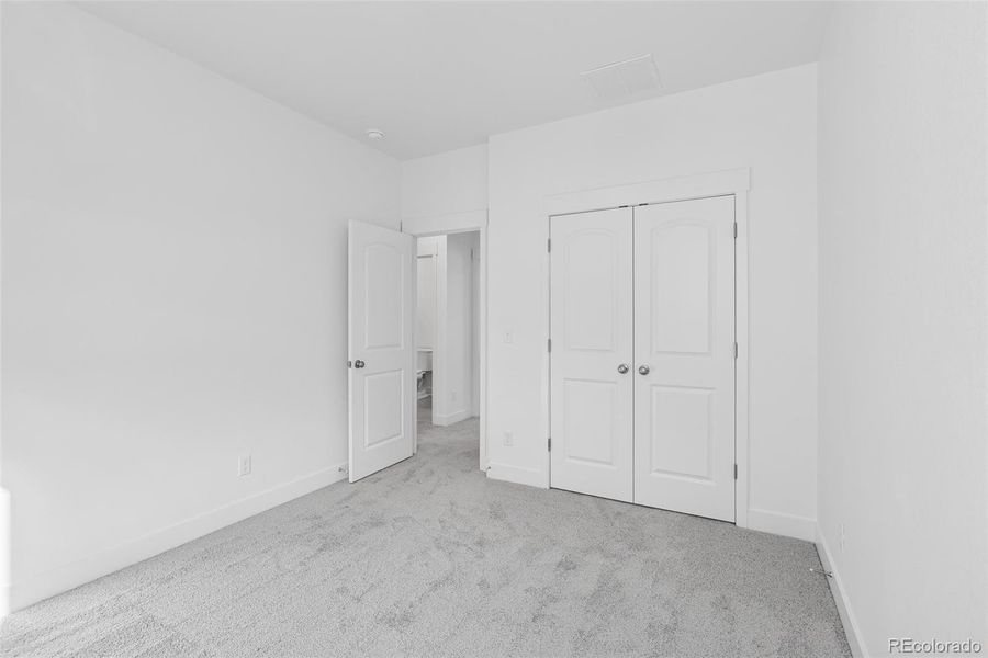 Spacious, unfurnished interior of a new home in Painted Prairie Cottage, Aurora (Image 25).