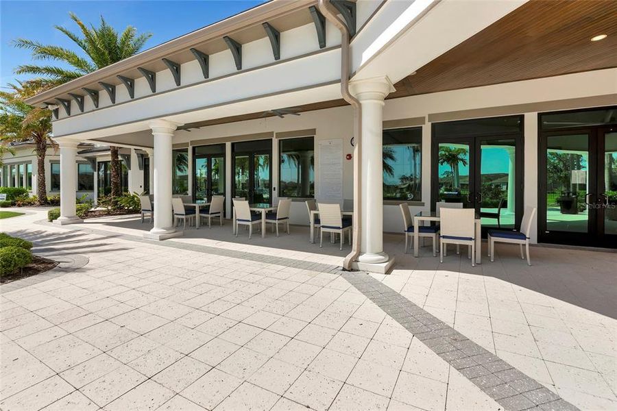 Front exterior of a new home in , Sarasota, FL, highlighting curb appeal (Image 21).