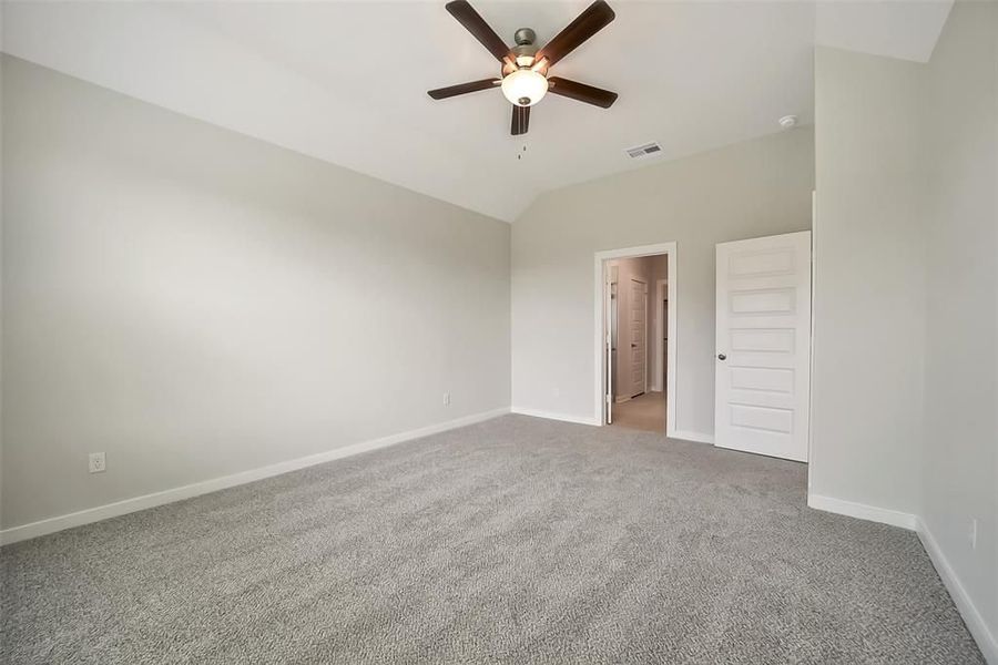 Spacious, unfurnished interior of a new home in Sunterra, Katy (Image 35).