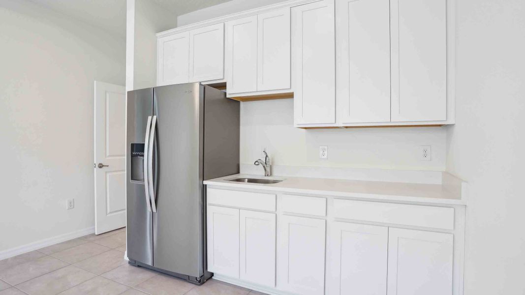 Representative furnished interior of a home built from the Camden by D.R. Horton in Ocala Preserve, Ocala (Image 12).
