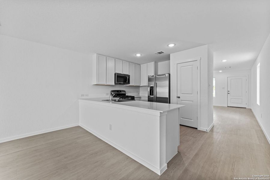 Furnished interior view inside a new home in Waterwheel: Cottage Collection, San Antonio (Image 15).