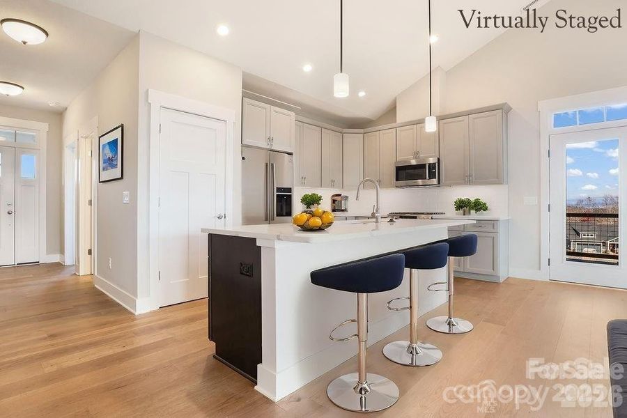 Large kitchen with abundant storage and upgraded appliances. Virtually staged. Similar Model Home. Large kitchen with abundant storage and upgraded appliances. Virtually staged. Similar Model Home.