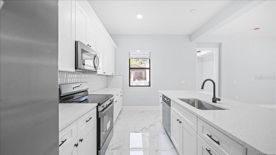 Furnished interior view inside a new home in , Lehigh Acres (Image 10).