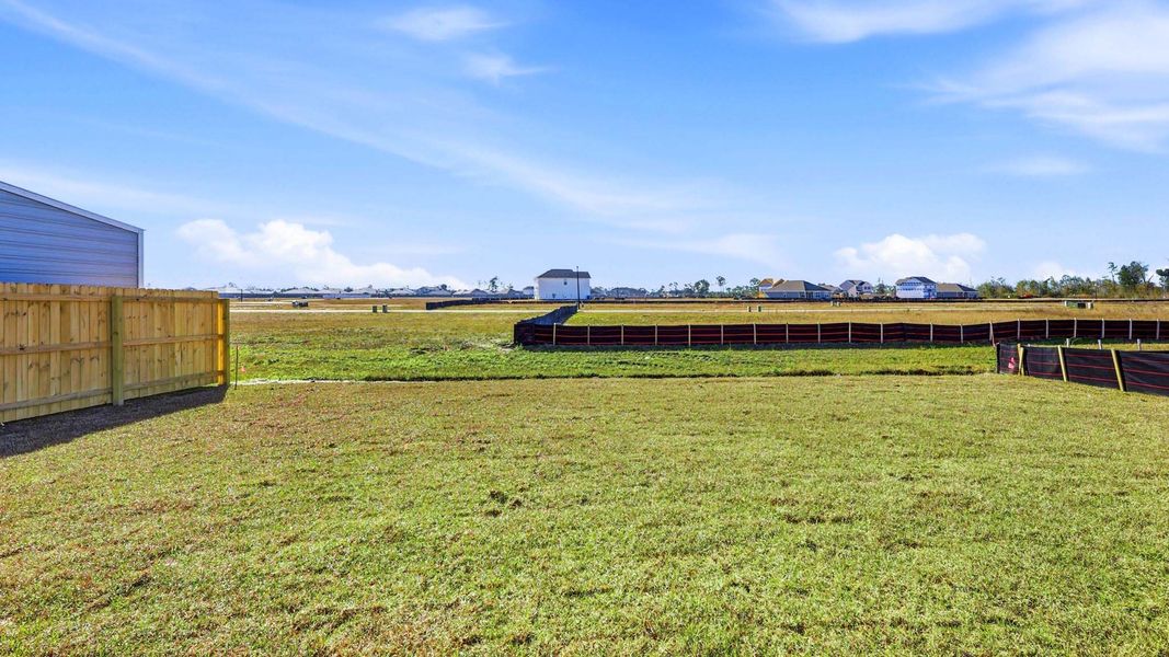 Exterior details and patio area of a home in Hodges Bayou Plantation, Panama City (Image 21).