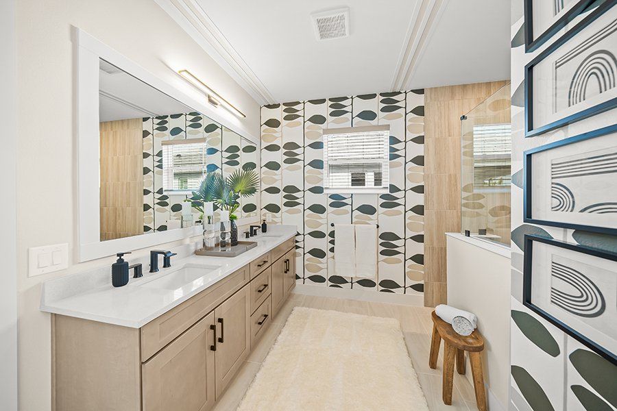 Representative furnished interior of a home built from the Regatta by Homes by Towne in Shellstone at Waterside, Sarasota (Image 13).