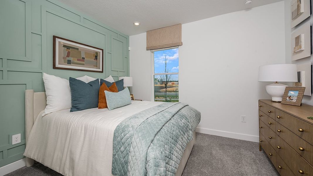 Representative furnished interior of a home built from the Caicos by Taylor Morrison in Esplanade at McKinnon Groves, Winter Garden (Image 12).