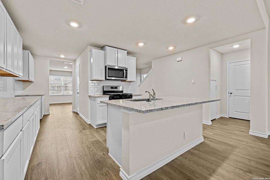 Furnished interior view inside a new home in Redbird Ranch, San Antonio (Image 9).