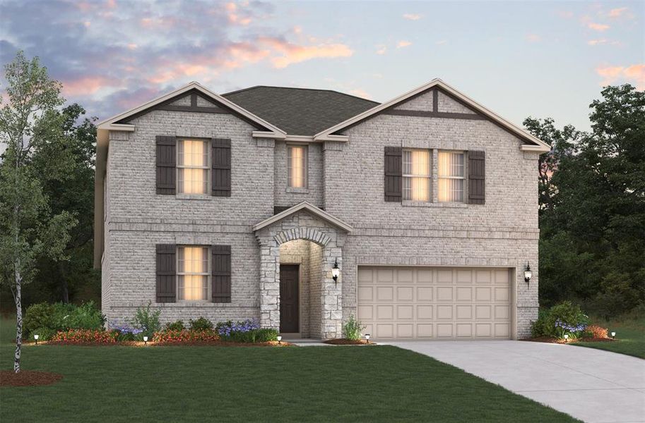 View of front facade with a garage and a lawn