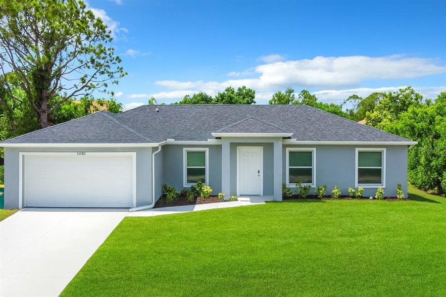Front exterior of a new home in , Punta Gorda, FL, highlighting curb appeal (Image 1). Front exterior of a new home in , Punta Gorda, FL, highlighting curb appeal (Image 1).