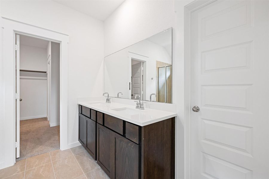 Furnished interior view inside a new home in Sunterra, Katy (Image 12).