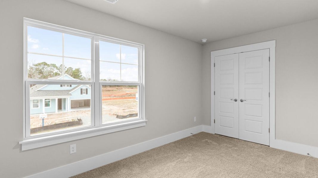 Spacious, unfurnished interior of a new home in Lockwood Landing, Supply (Image 28).