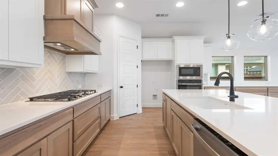 Furnished interior view inside a new home in North Sky 55', Celina (Image 8).