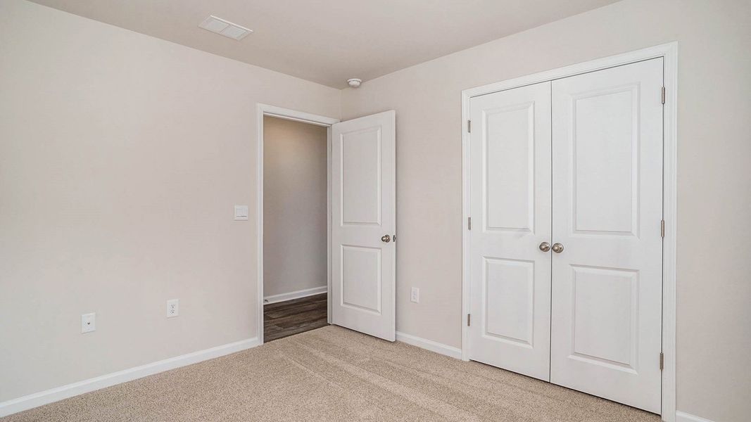 Spacious, unfurnished interior of a new home in Meadow Walk, Loris (Image 13). Spacious, unfurnished interior of a new home in Meadow Walk, Loris (Image 13).