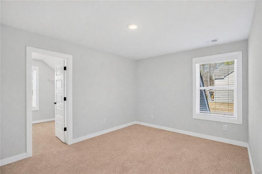 Spacious, unfurnished interior of a new home in The Fairways at Mirror Lake, Villa Rica (Image 46).