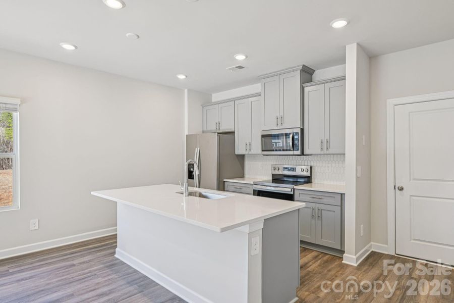 Photo is not of the actual home, but is an inspirational photo of builder’s model home and may depict options, furnishings, and/or decorator features that are not included