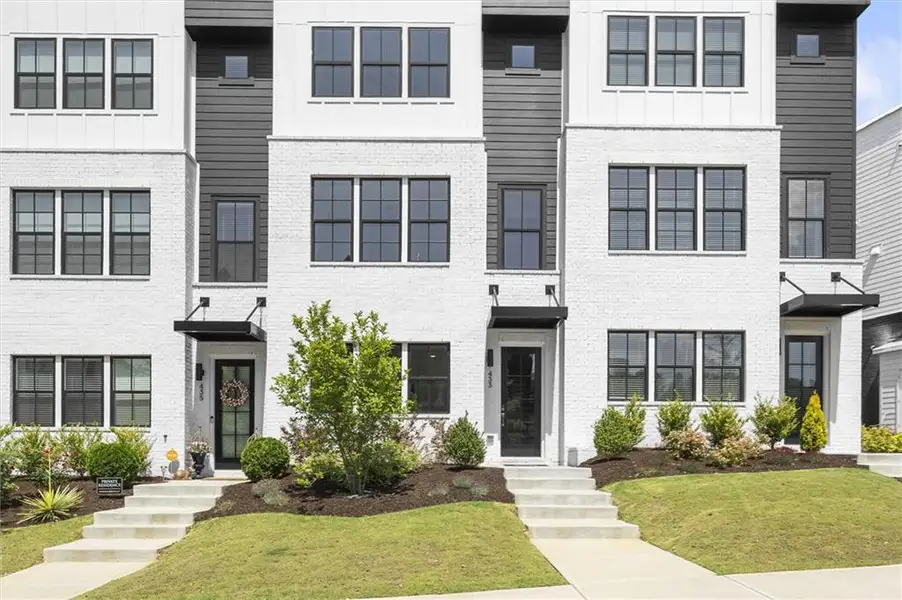 Front exterior of a new home in The Gathering – Alpharetta, Alpharetta, GA, highlighting curb appeal (Image 23).
