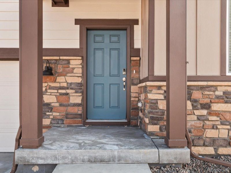 Exterior details and patio area of a home in Revere at Johnstown, Johnstown (Image 3).