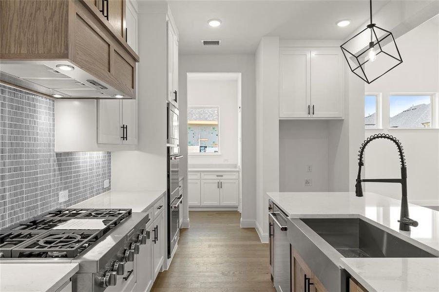 Furnished interior view inside a new home in Painted Tree Woodlands, McKinney (Image 11).