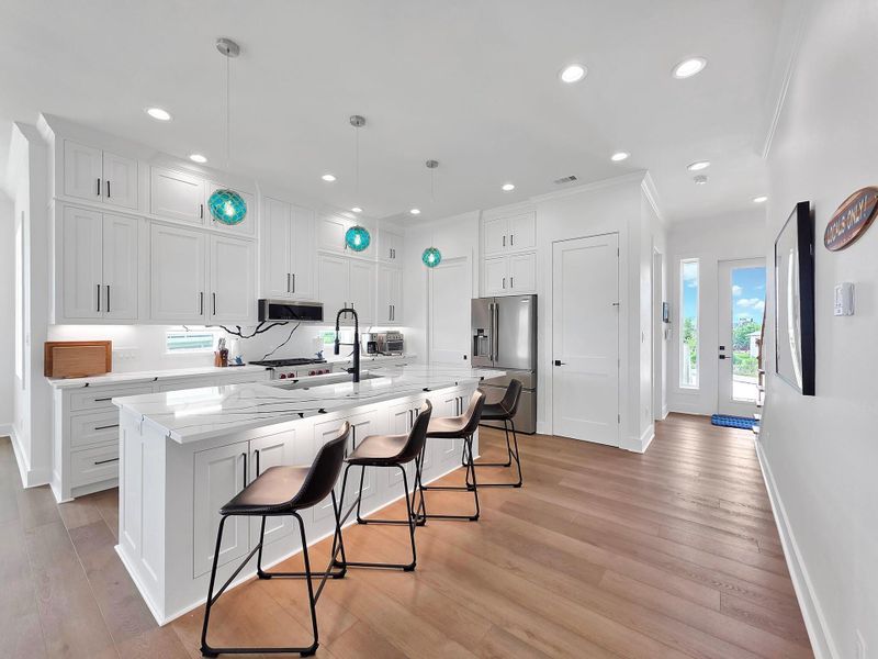 Beautiful kitchen island that is the perfect gathering place while preparing family meals or just enjoying a charcuterie board and beverages
