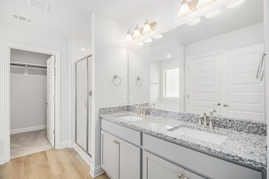 Primary Bathroom with Double Vanity Sinks