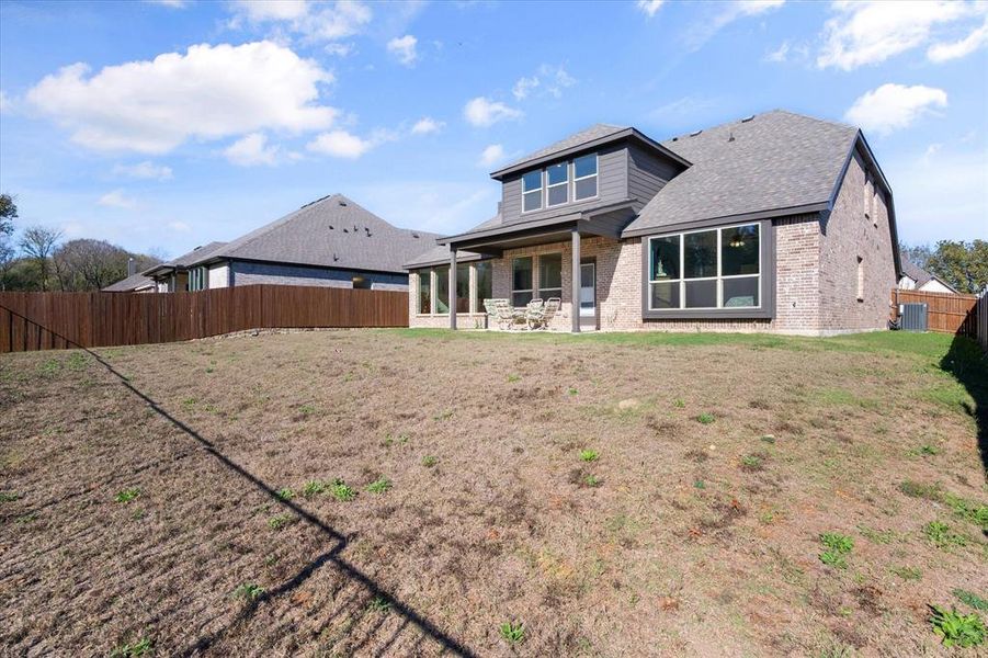 Exterior details and patio area of a home in Massey Meadows, Midlothian (Image 4).