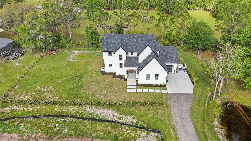 Front exterior of a new home in , St. Cloud, FL, highlighting curb appeal (Image 29).