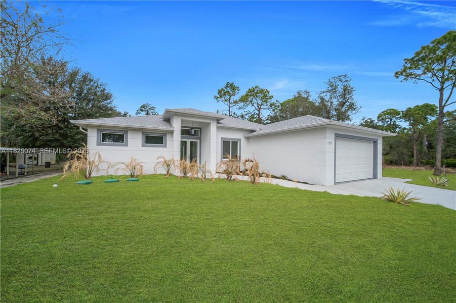 Exterior details and patio area of a home in , Lehigh Acres (Image 4).