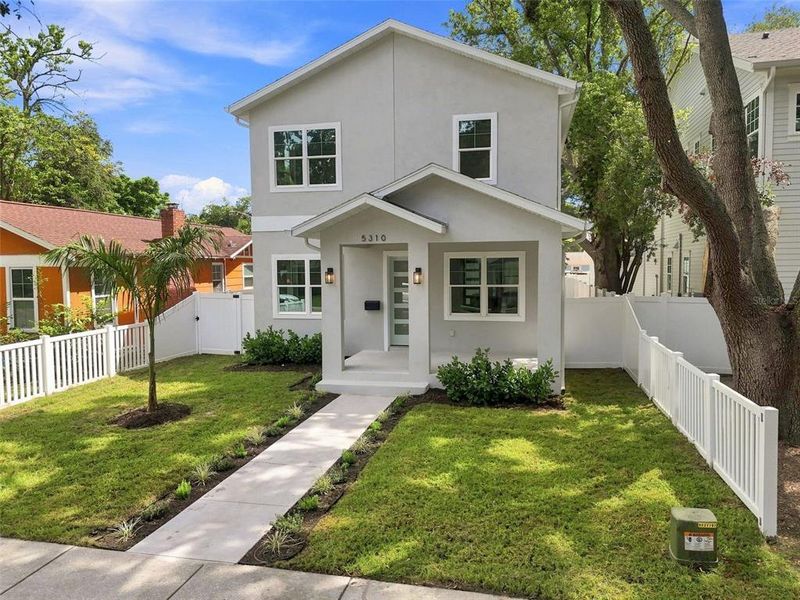 Front exterior of a new home in , St. Petersburg, FL, highlighting curb appeal (Image 34). Front exterior of a new home in , St. Petersburg, FL, highlighting curb appeal (Image 34).