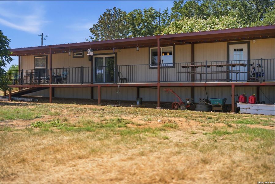 Exterior details and patio area of a home in , Devine (Image 22).
