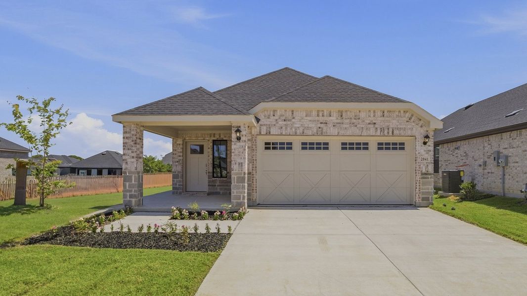 Representative exterior photo of a completed home built from the Bailey by D.R. Horton in Windchime, Celina, TX (Image 13).