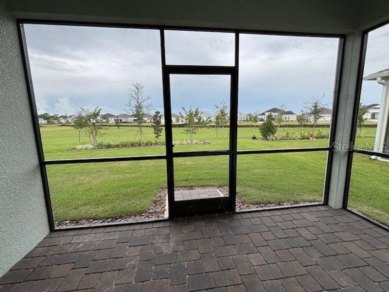 Exterior details and patio area of a home in Lakes of Mount Dora, Mount Dora (Image 2).