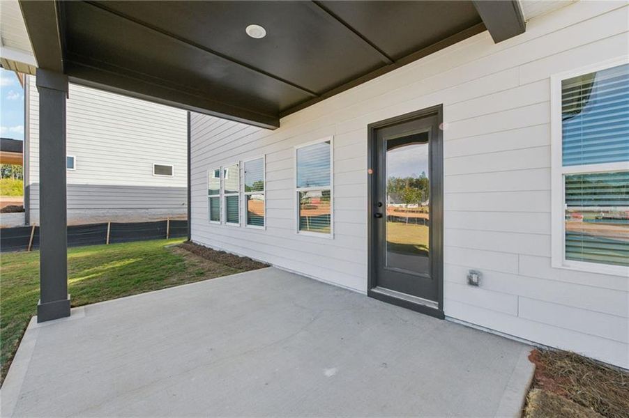Exterior details and patio area of a home in Vines at Mill Creek - Estate Series, Braselton (Image 18). Exterior details and patio area of a home in Vines at Mill Creek - Estate Series, Braselton (Image 18).