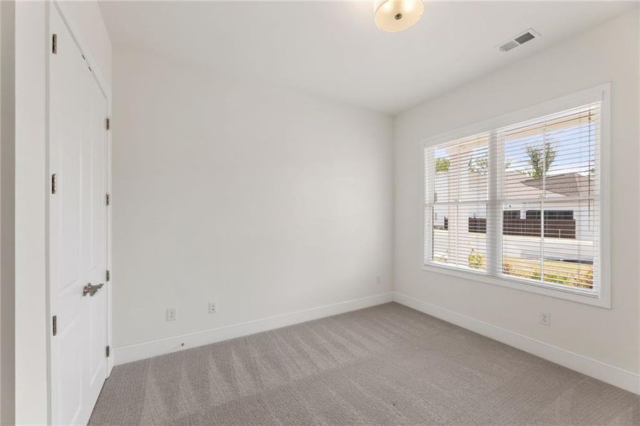 Spacious, unfurnished interior of a new home in Courtyards at Traditions, Cumming (Image 15).
