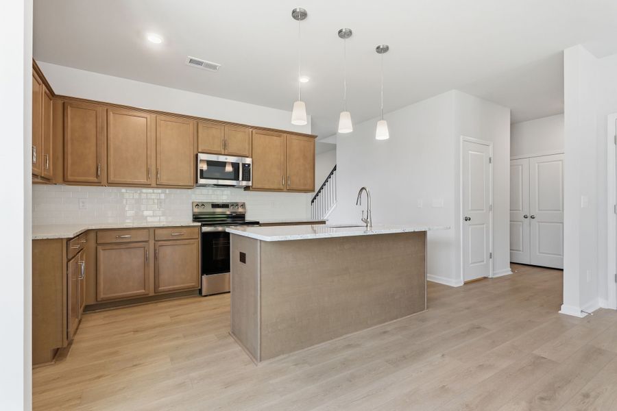 Furnished interior view inside a new home in Piper Creek, Newton (Image 10).