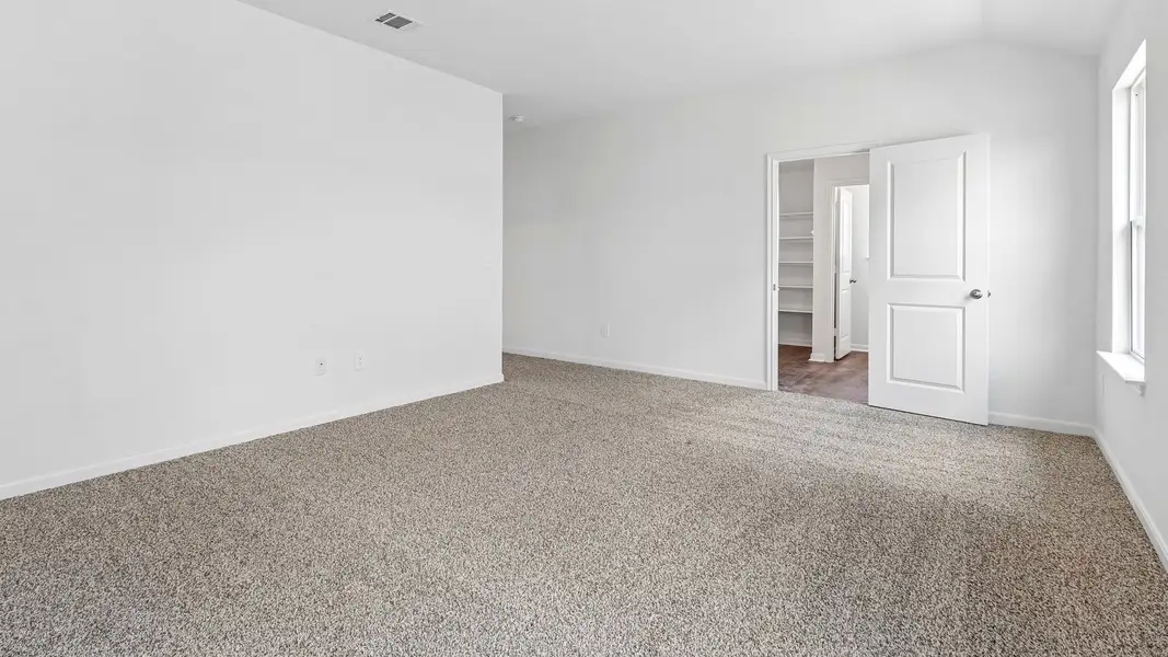 Spacious, unfurnished interior of a new home in Prairie Lakes, Buda (Image 24).