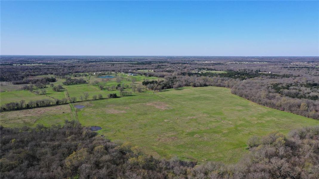 Aerial view featuring a rural view Aerial view featuring a rural view