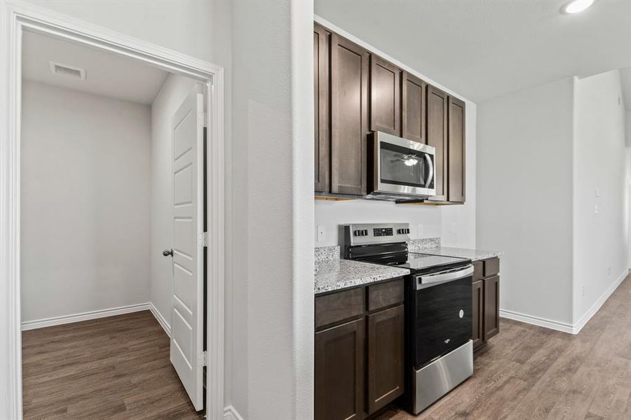 Furnished interior view inside a new home in Retreat at Fossil Creek, Fort Worth (Image 7).