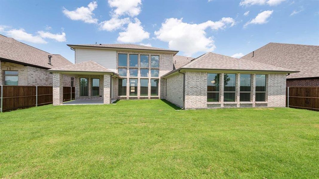 Front exterior of a new home in , Forney, TX, highlighting curb appeal (Image 18). Front exterior of a new home in , Forney, TX, highlighting curb appeal (Image 18).