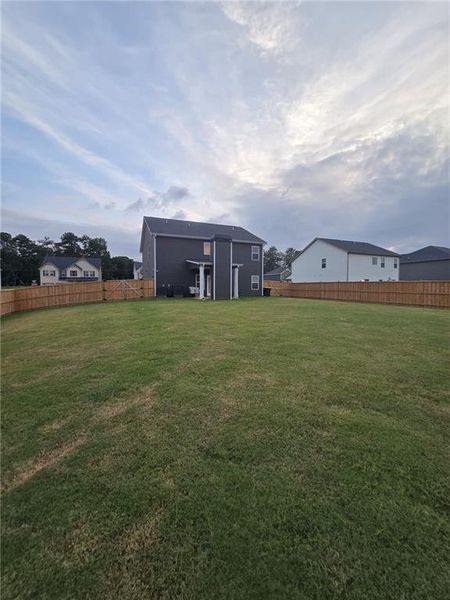 Exterior details and patio area of a home in Fern Dale, Fairburn (Image 45).