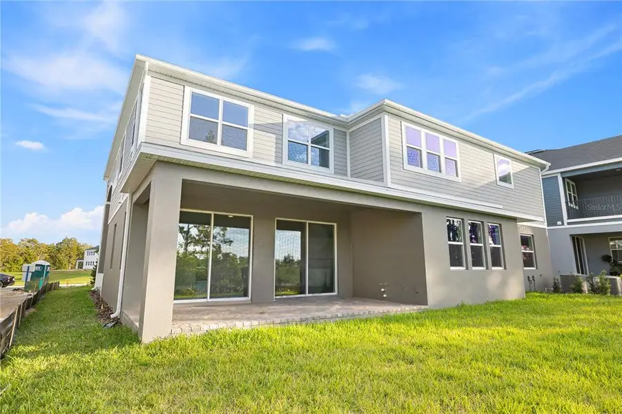 Exterior details and patio area of a home in , Winter Garden (Image 2). Exterior details and patio area of a home in , Winter Garden (Image 2).