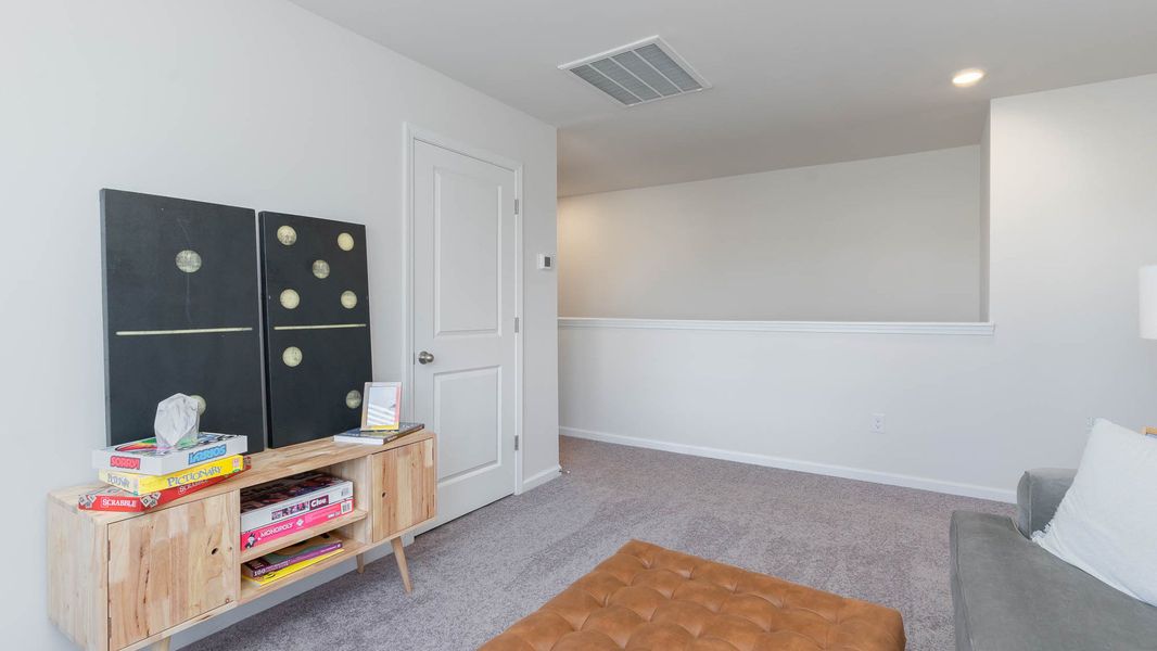 Representative furnished interior of a home built from the Hayden by D.R. Horton in Magnolia Farms, Florence (Image 15).