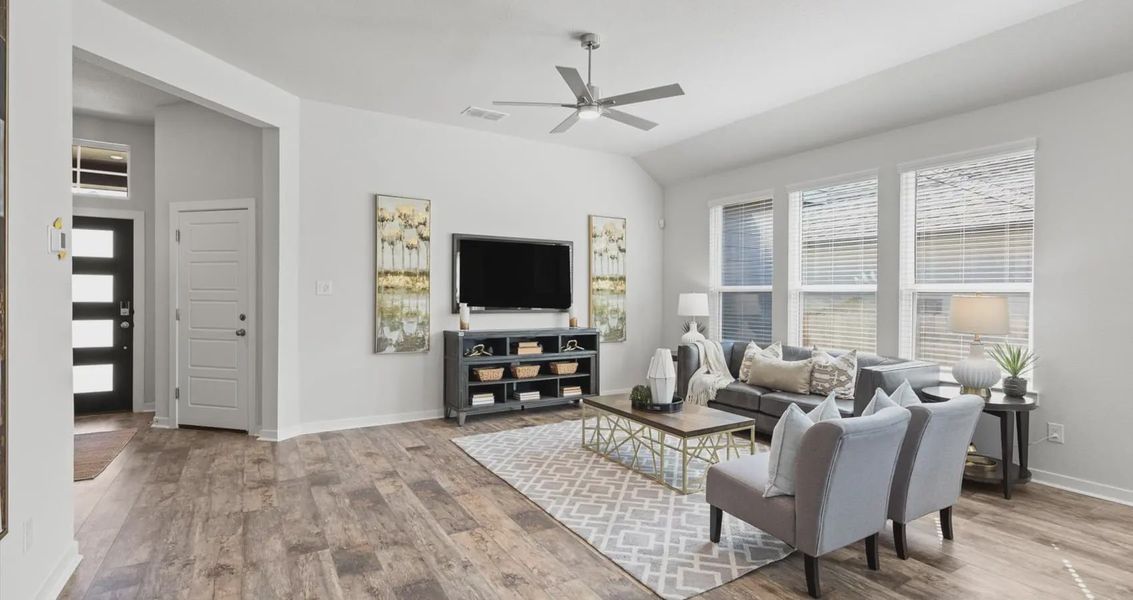 Representative furnished interior of a home built from the Avril by Chesmar Homes in Trace, New Caney (Image 12).