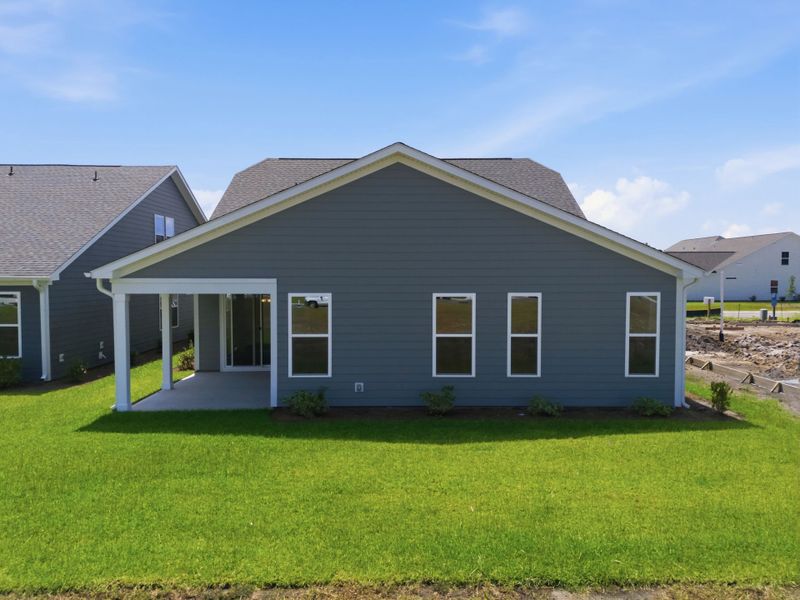 Exterior details and patio area of a home in Terrapin, Leland (Image 20).